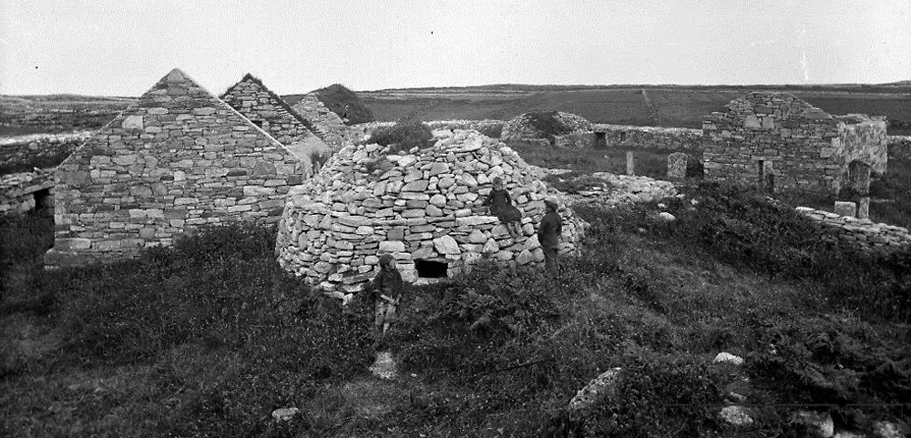An early photograph of the buildings within the Cashel on Inishmurray Island in County Sligo.