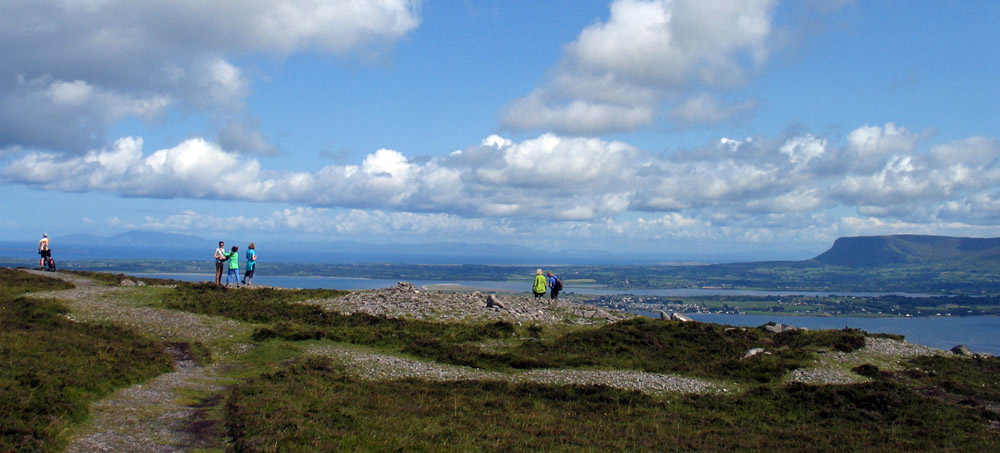 The small passage-grave to the north of Queen Maeve's cairn on the flat summit of Knocknarea.