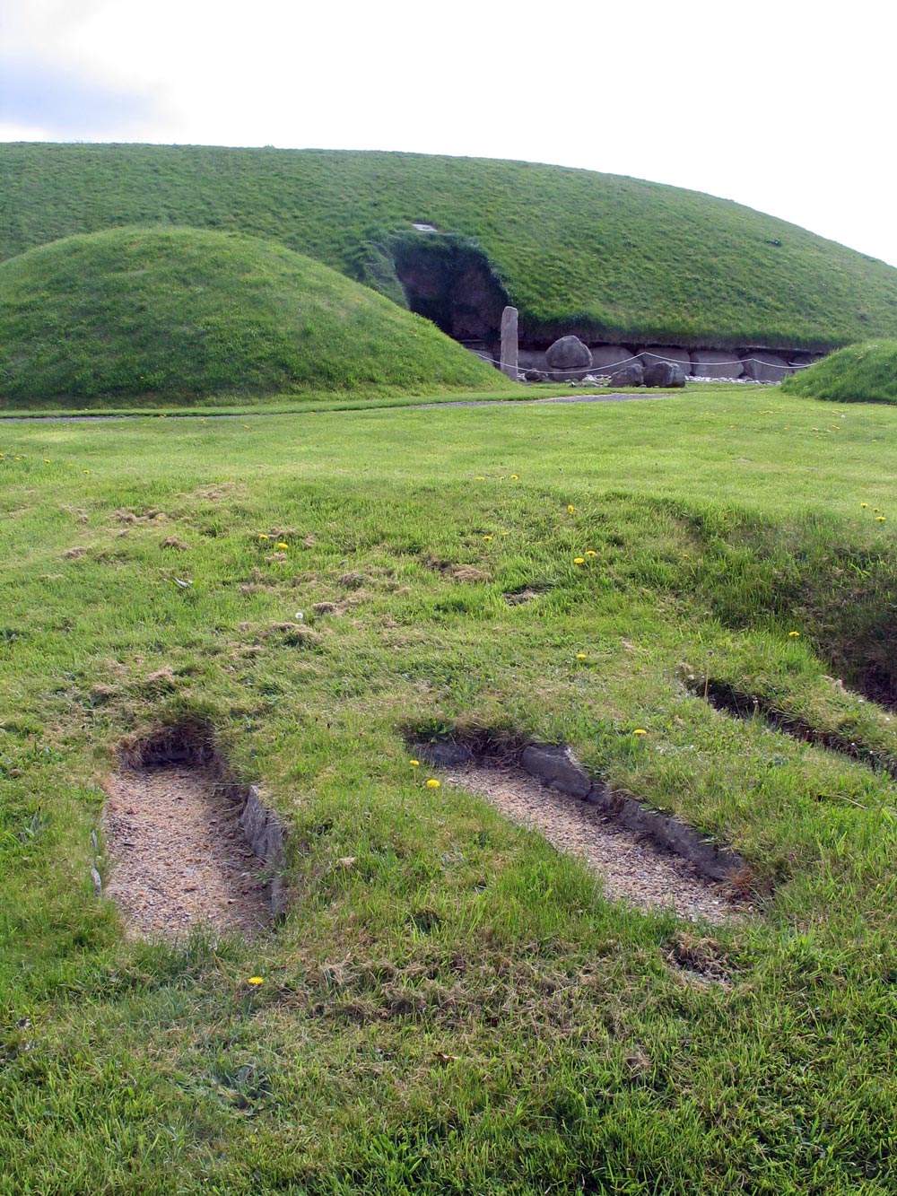Four slab-lined Iron age graves at Knowth.