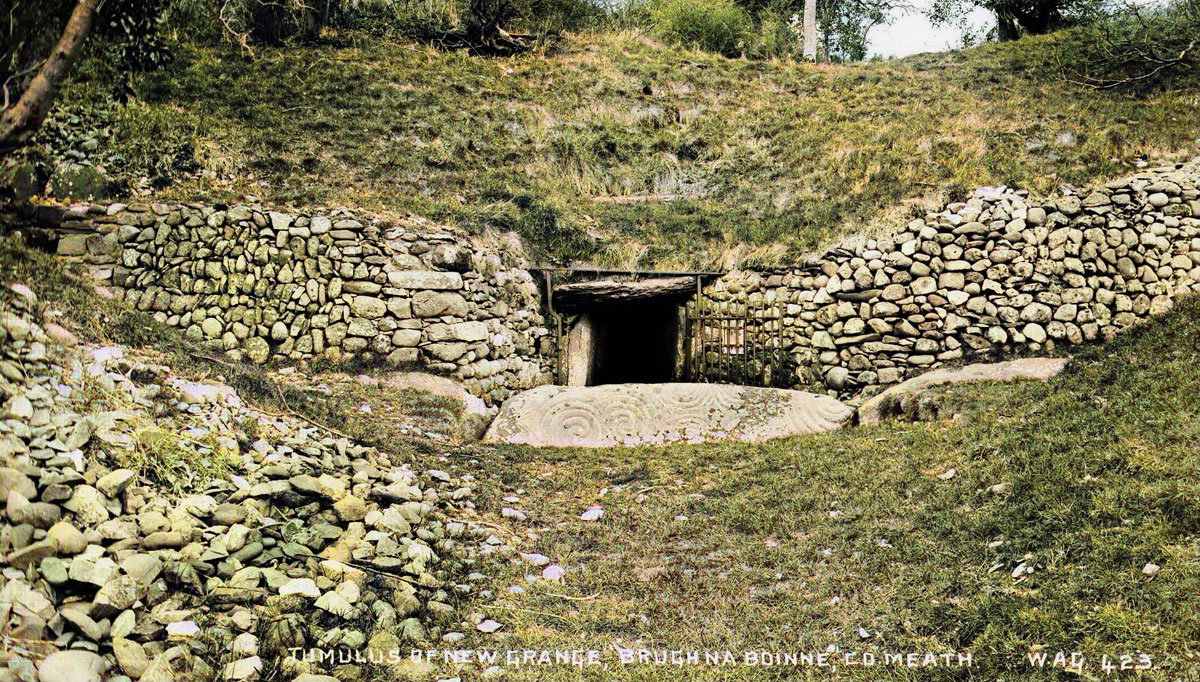The exterior of Newgrange in a pre-restoration photograph of the monument taken bt Belfast photographer William A. Green.