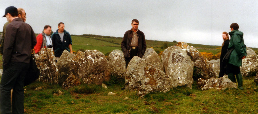 Goran Burenhult (centre), the chief excavator leads a tour at Circle 27, Carrowmore 
during the Stones and Bones conference in 2002.