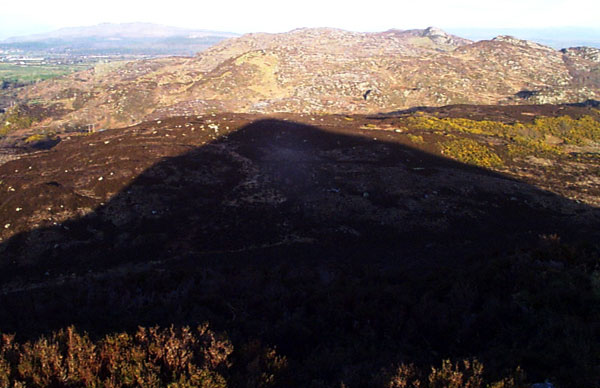 On the equinoxes, Croughan peak casts a dramatic shadow which acts like a sundial.