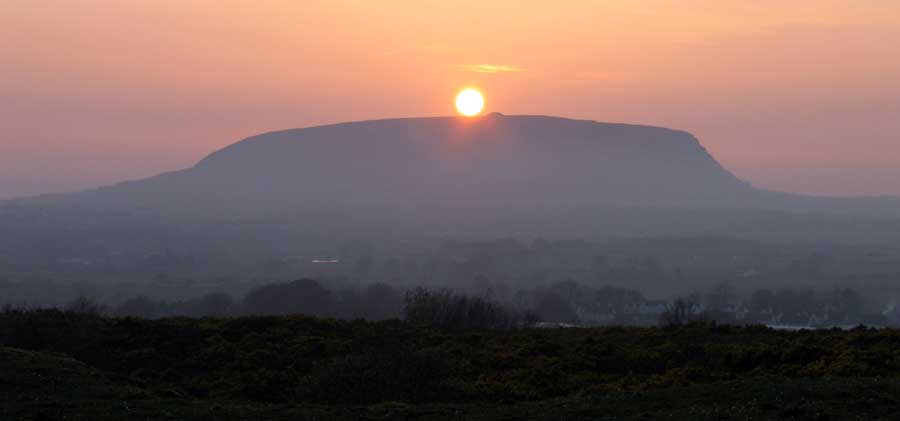 Equinox sunset over Queen Maeve's cairn.