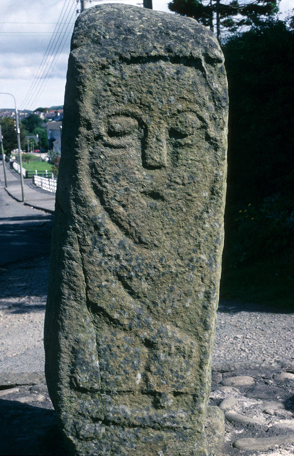 Figure with bell, Carndonagh.