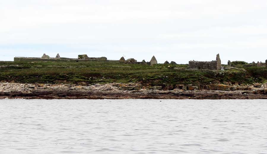 View of the Cashel and the Women's church from the waters to the south of the Island.