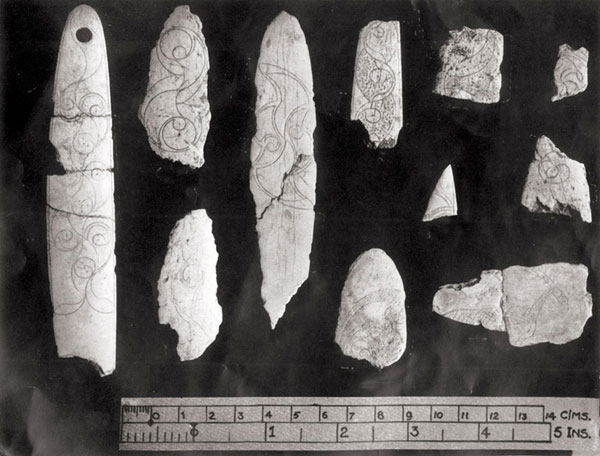 Carved bone slips from Cairn H at Loughcrew.