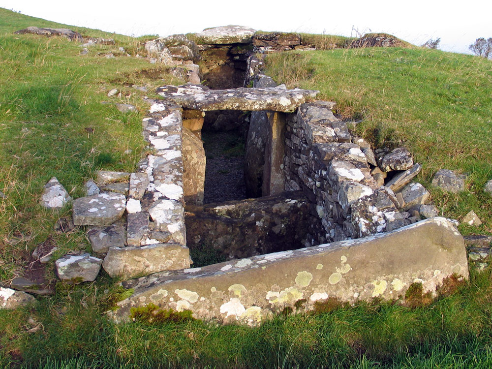 Looking into the entrance
      of Cairn H.