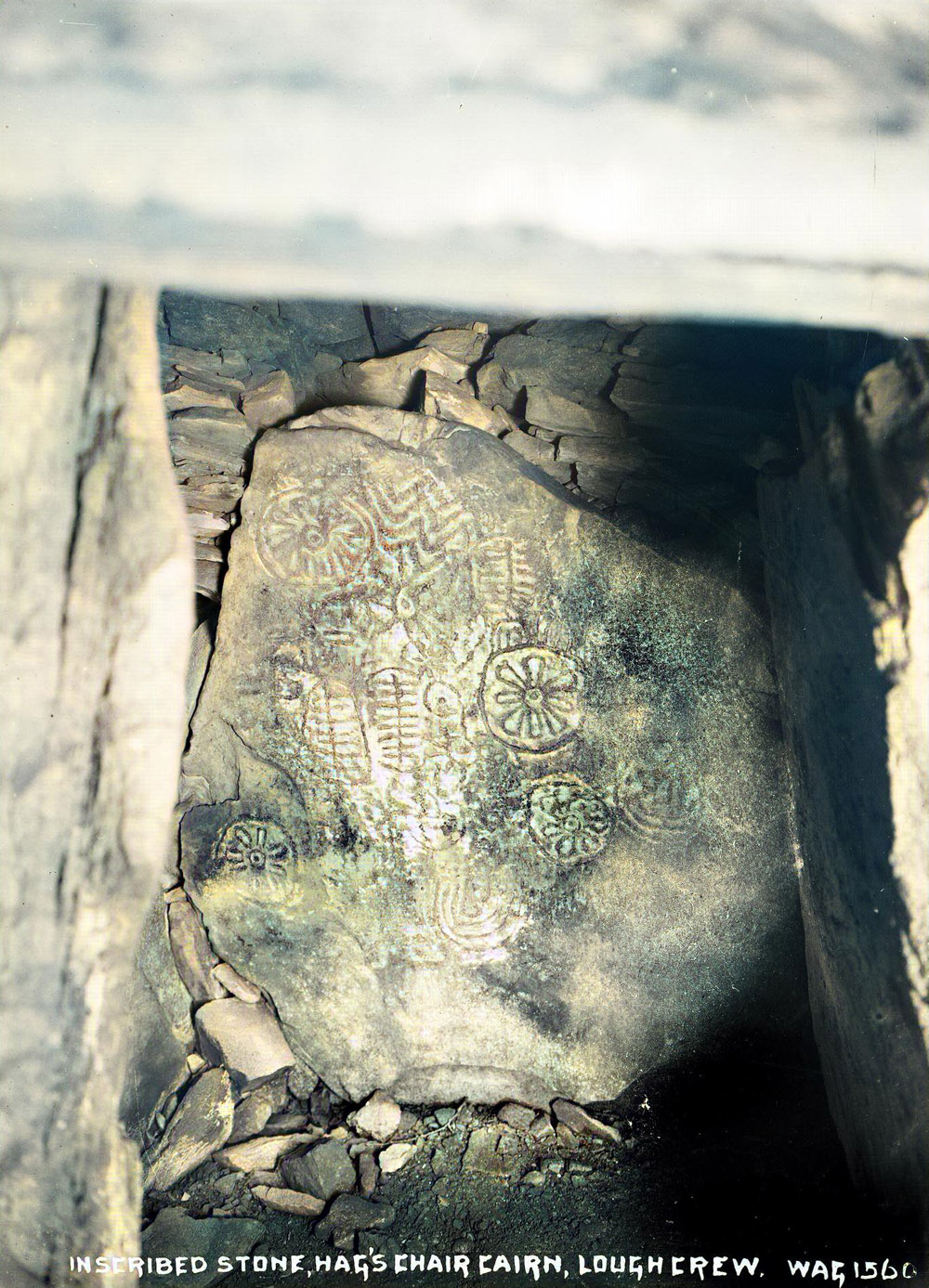 The keystone within Cairn T photographed by William A. Green.