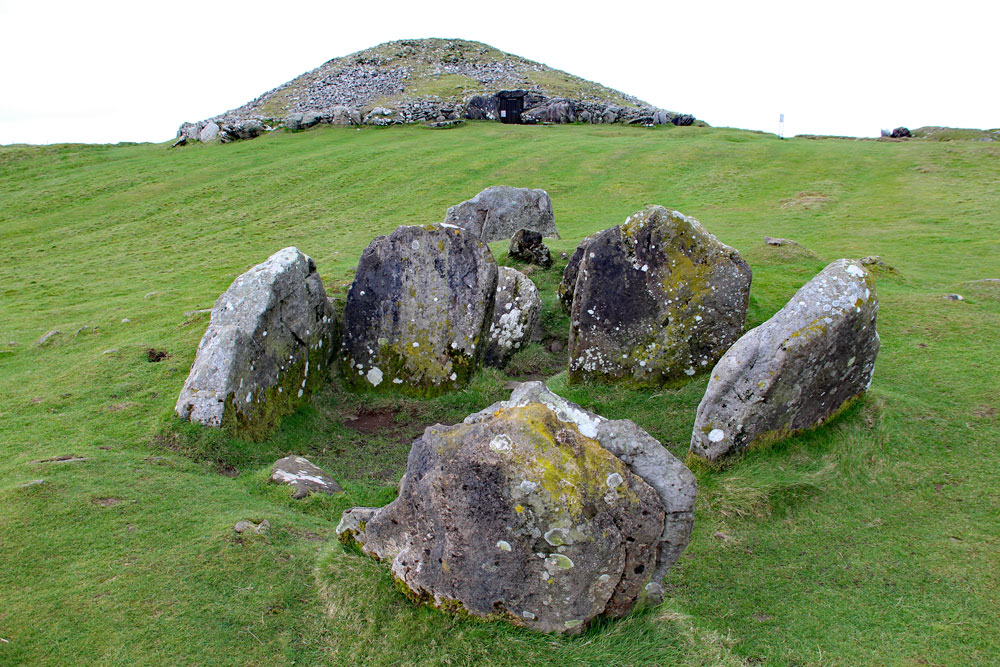 Looking northwest across the chamber of Cairn V to the main monument known as Carn Ban, The Hag's Cairn, or Cairn T.