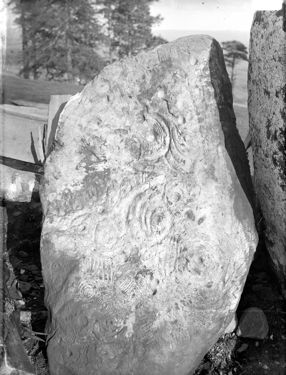 Passage-grave art at Knockmany in County Tyrone, photographed by Robert Welch.