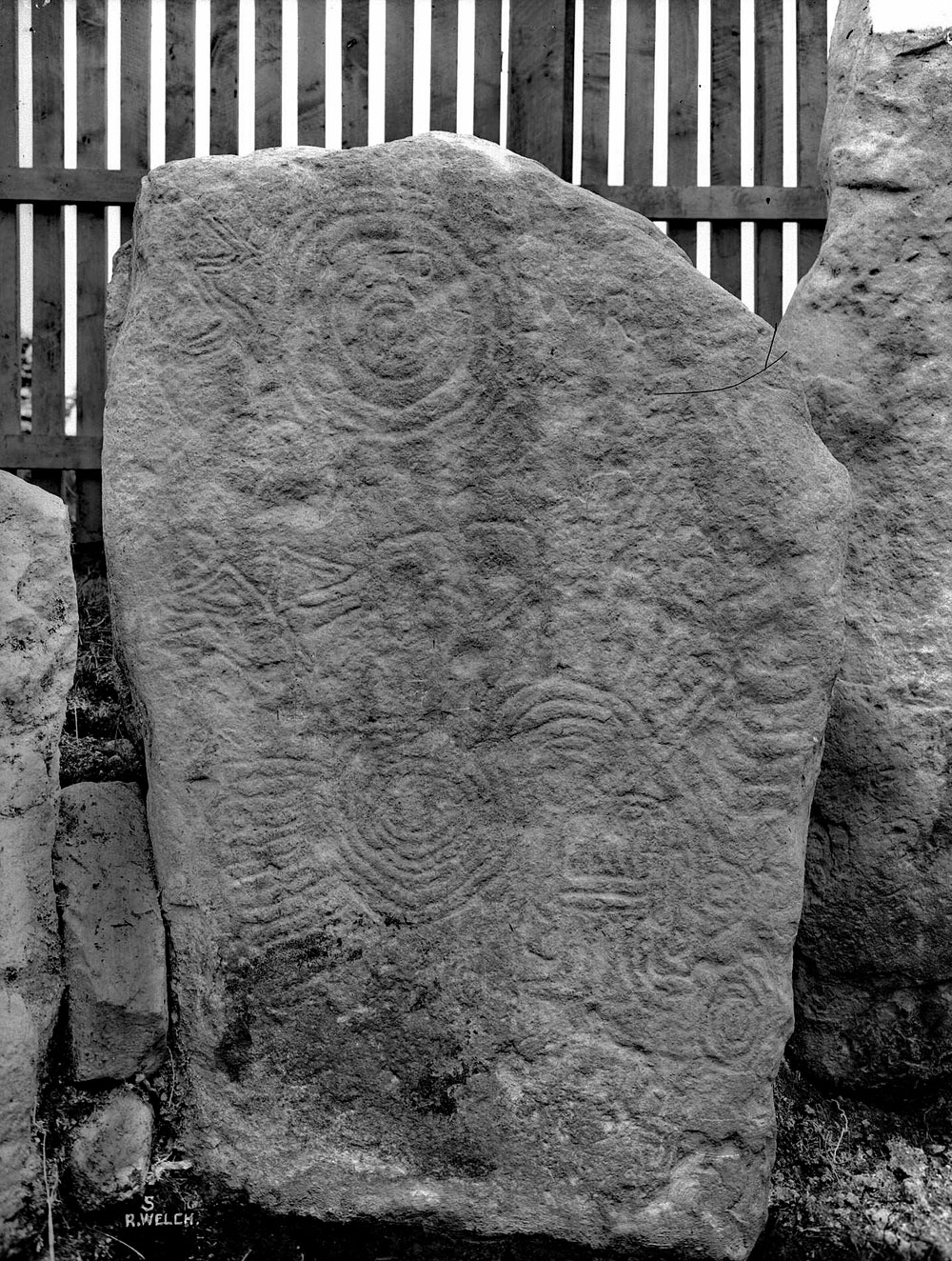 Passage-grave art at Knockmany in County Tyrone, photographed by Robert Welch.