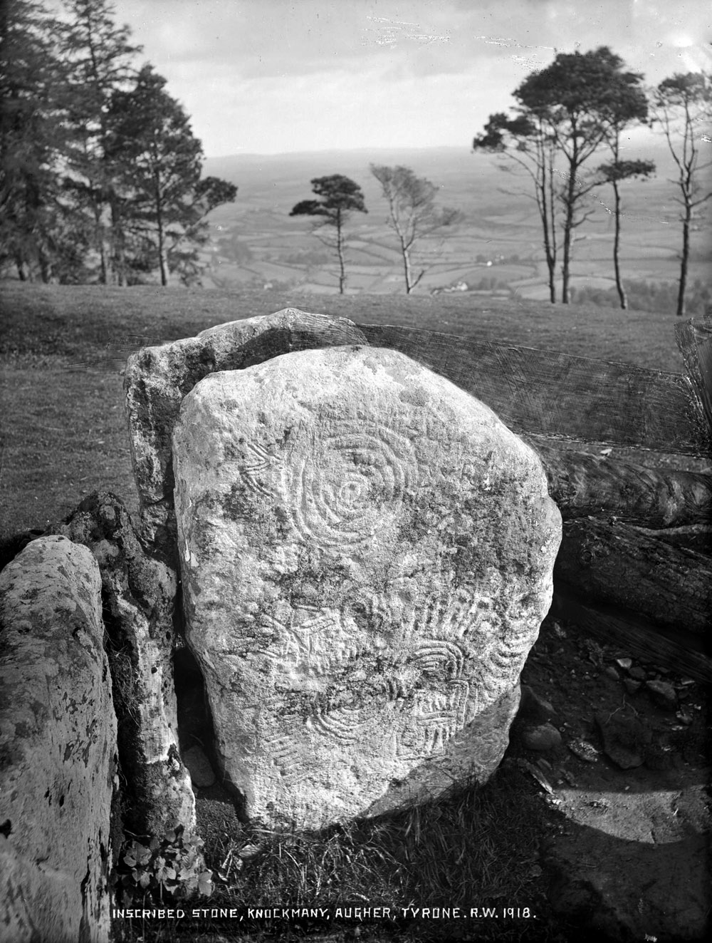 Passage-grave art at Knockmany in County Tyrone, photographed by Robert Welch.