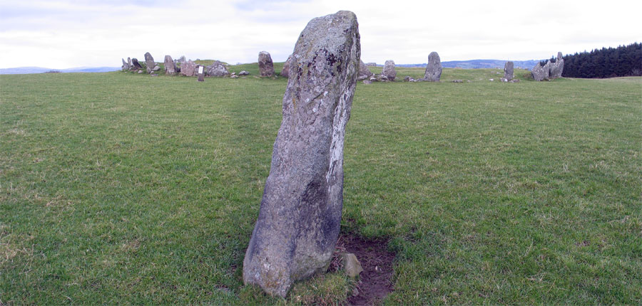 Beltany stone circle viewed from the outlying standing stone.