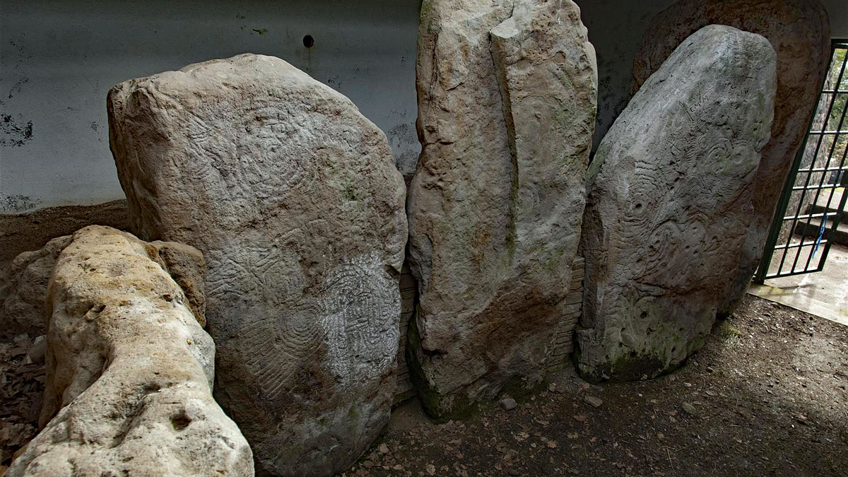 The engraved art on the chamber stones in the Knockmany passage-grave in County Tyrone.