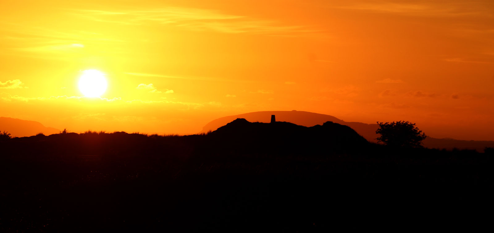 The midsummer sunset viewed from Shee Lugh, Moytura, County Sligo.